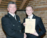 katie-wynn-185 Katie Wynn receiving her award from Chief Superintendent Alasdair Hope