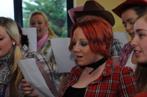 tesco call centre staff sing for their supper!