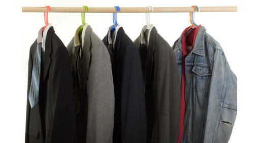 Smart and casual clothes hanging on a rail