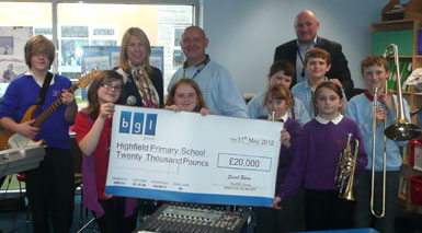 Fusion Site Manager, Sarah Burns, presents the cheque to Highfield Primary School