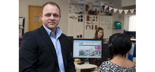 Tony Jopling and contact centre staff