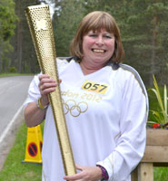 Moyra holding the Olympic torch