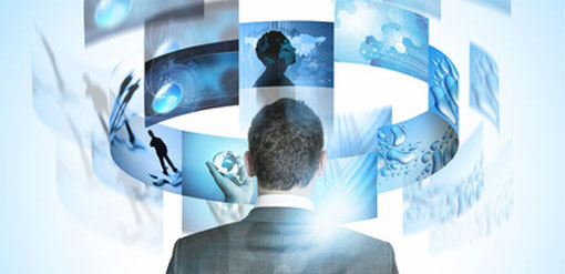 man looking at touchscreen images
