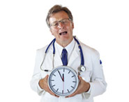 unhappy doctor holding a clock