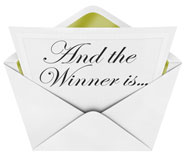 envelope with card saying and the winner is...