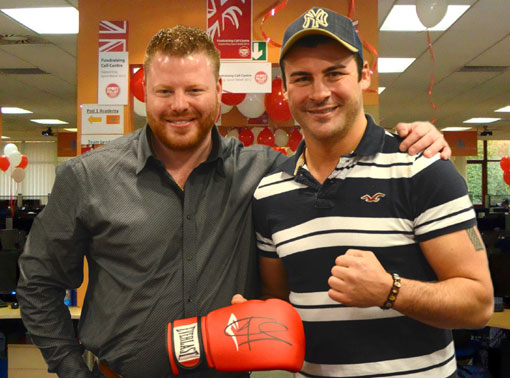 Joe Calzaghe with a signed boxing glove
