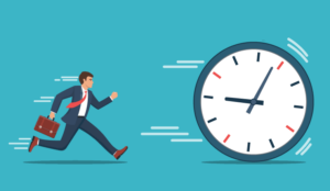 A picture of a businessperson chasing a clock