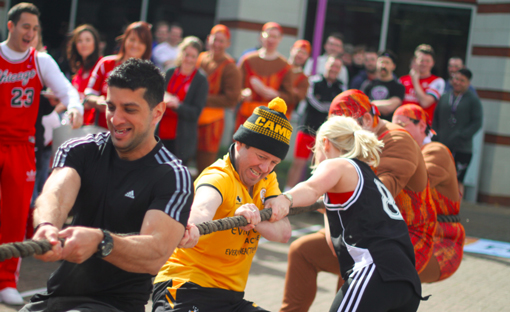 Tug of war being carried out in the car park 