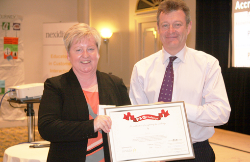 Serco-Julia-Ashman-receiving-the-certificate-510