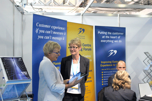 Katherine tests our her smile on the Professional Planning Forum stand