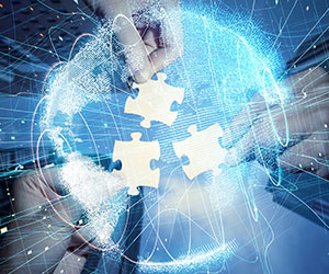 metamorworks - Shutterstock - 796560889 Pieces of jigsaw puzzle and global network concept.