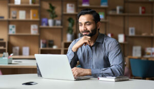 man on computer