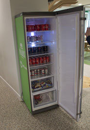 An office fridge with a range of drinks available to the staff