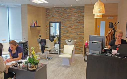 An employee gets her nails done at the spa at the Bolton AO headquarters