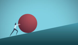 Cartoon woman pushing a red ball up a slope