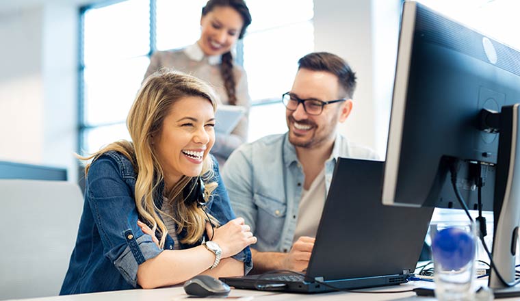 Group of business people and software developers working as a team