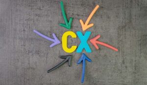 colorful arrows pointing to alphabet CX at the center of chalkboard