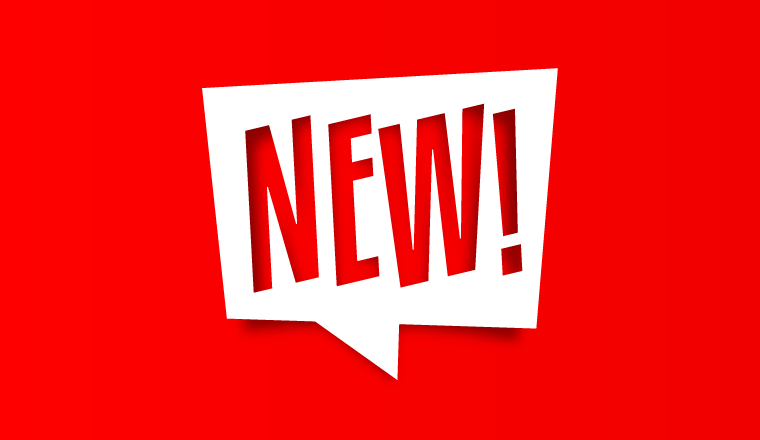 A white sign saying new! in front of a red background