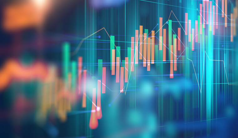 A graph with orange and turquoise bars on a blurry background