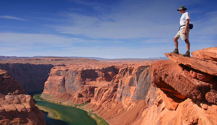 Young Hiker overlooking Grand Canyon