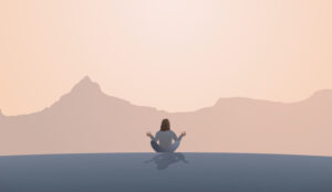 A woman meditated in from on some distant mountains