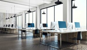 Minimalistic coworking office interior with equipment, furniture, city view and daylight.