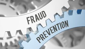 A picture of two cogs, one labelled "fraud" and the other "prevention"