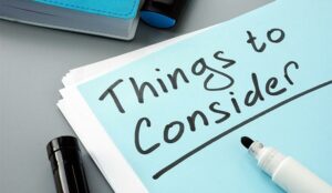 A photo of a piece of paper with the words "things to consider"