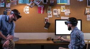 A trendy office with two people wearing virtual reality headsets