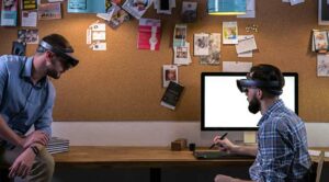 A trendy office with two people wearing virtual reality headsets