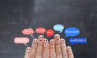 Finger tips have smiley faces and 'poor', 'so-so', 'average', 'BAD', 'good', 'excellent' and 'awesome'
