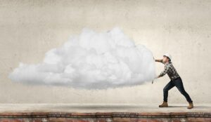 A picture of a builder moving a cloud