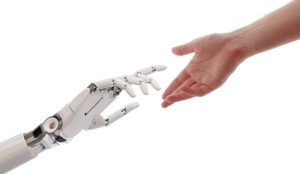 A picture of a persons hand and a robot hand