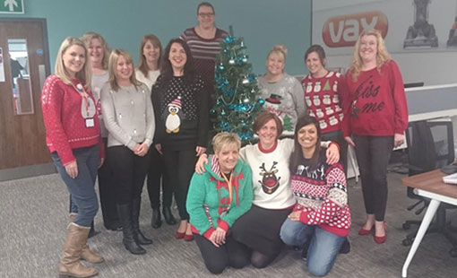 A photo of the Vax contact centre team celebrating Christmas