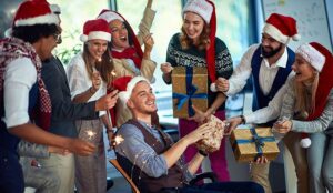 A photo of an office team having fun a Christmas