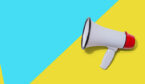 A photo of a megaphone on a blue and yellow background