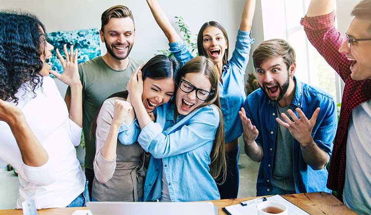 A photo of a happy group of interns