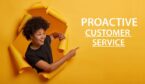 A picture of someone pointing to the words "proactive customer service"