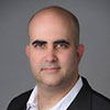 A headshot of Oded Karevc