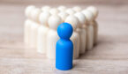 A picture of a blue figurine leading a group