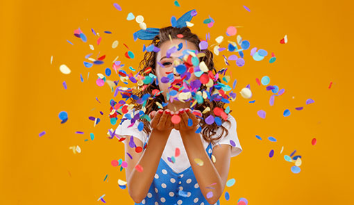 A picture of someone having fun with confetti