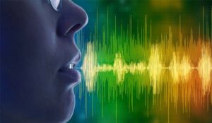 A picture of a person speaking and sound waves