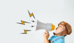 A picture of a child shouting down a megaphone