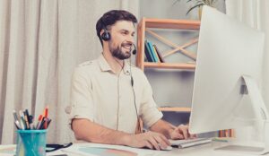 A photo of a call centre agent listening