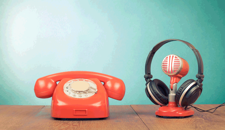 orange telephone headset and microphone