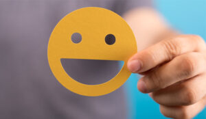 A picture of a cut out smiley face