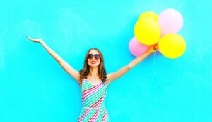 A photo of someone having fun with balloons