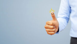A photo of a thumb with a crown