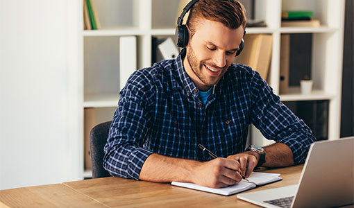 A picture of a remote agent making notes