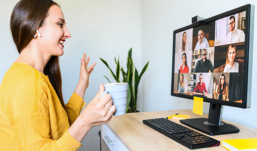 A photo of somemone with a mug on a virtual meeting